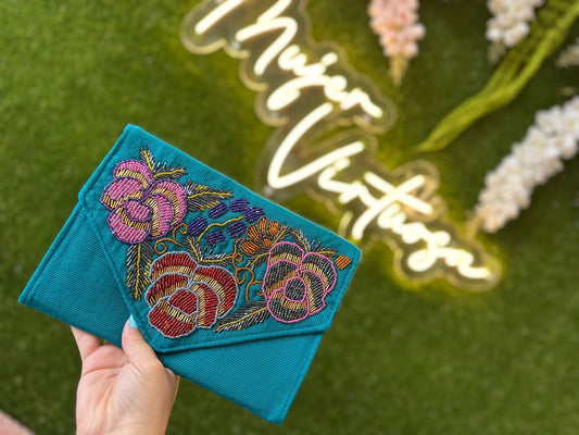 Turquoise beaded clutch bag
