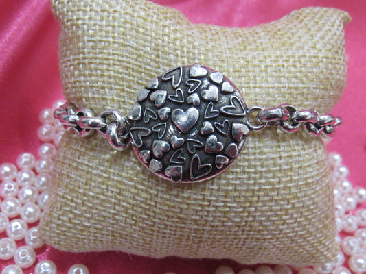 TUCCO Pulsera Placa de Corazones Plata